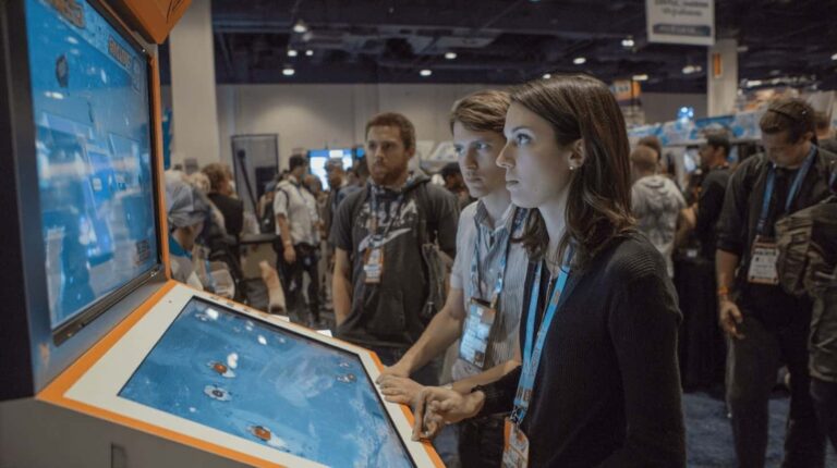 people playing branded mini games at tradeshow